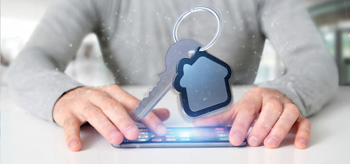 Man holding a Key and house 3d rendering