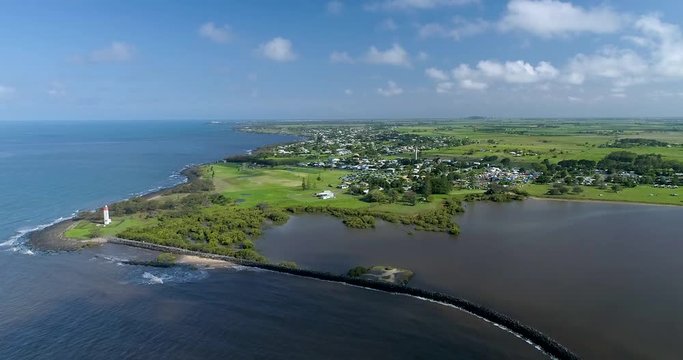 Burnett Heads, Queensland / Australia - October 2017 - Aerial Footage of Coastline and Lighthouse, looking back towards Barbara and Mon Repos