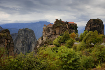 Fototapeta na wymiar Great Meteoron Monastery. Beautiful scenic view, ancient traditional greek building on the top of huge stone pillar in Meteora,Thessaly, Greece, Europe