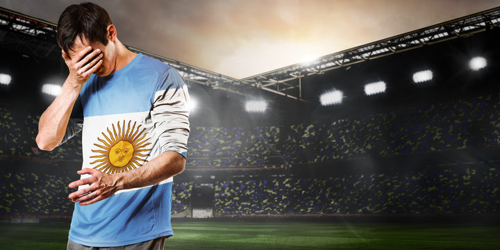 Argentina national team. Sad soccer or football player on stadium