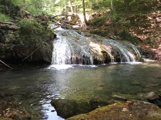 Naklejka na ściany i meble beautiful waterfall in the forest