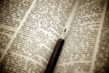 Fototapeta premium Black pencil on old book