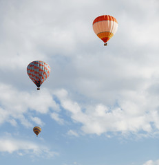 Three air balloons flying in the sky