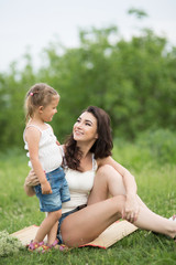 Fototapeta premium woman and children in nature