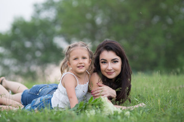 Fototapeta premium woman and child in nature