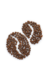 Silhouette of seeds made from roasted coffee beans. isolated on white background