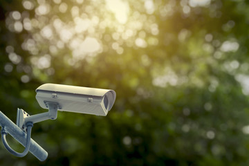 Closed Circuit Television camera. Closed circuit television recording on nature background.