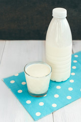 Kefir on white wooden background. Dairy products.