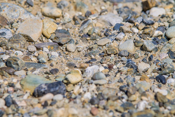 cobblestones and little stones background and texture