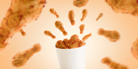 Blank food bucket with chicken wings mock up, no gravity, 3d rendering. Empty pail fastfood mockup,...