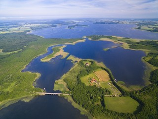 Aerial view of beautiful landscape of lake district, bridge between Dargin and Kirsajty Lakes, next Mamry Lake, Mazury, Poland - obrazy, fototapety, plakaty