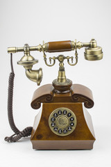 old retro wooden phone on white background