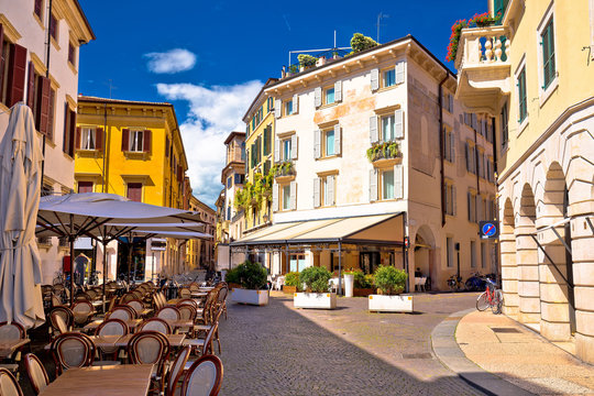 Fototapeta Italian street and cafe in Verona view