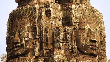 Fototapeta premium faces of Bayon, Angkor Thom, historical ruins of Angkor Khmer Empire, Siem Reap, Cambodia