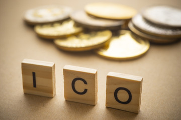 ICO on wood.