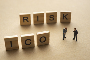 Businessman thinking about invest ICO initial coin offering concept