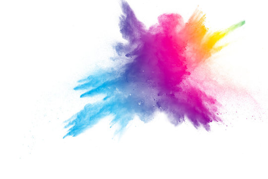 Explosion of rainbow color powder on white background.
