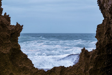 Ocean through rocks, waves, South Africa
