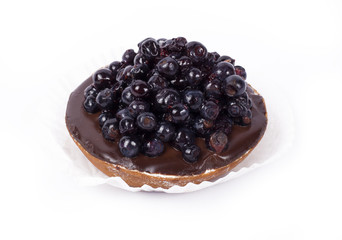 Chocolate blueberry cake isolated on white background