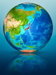 Japan on Earth on reflective surface