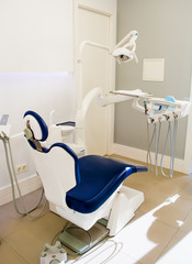 Modern dental practice. Dental chair and other accessories used by dentists