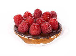 Chocolate raspberry dessert cake isolated on white background