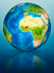 Burkina Faso on Earth on reflective surface