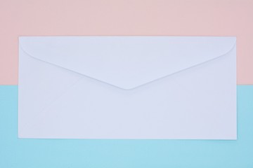 white envelope mail on blue and pink background