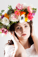 future mother has a wreath with flowers