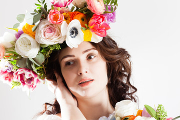 future mother with flowers wreath