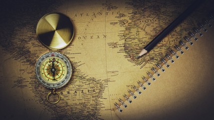 Bangkok, Thailand - June 15, 2018: Old compass on antique map.