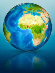 Benin on Earth on reflective surface