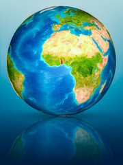 Togo on Earth on reflective surface