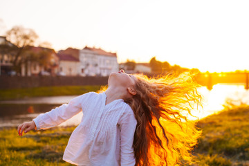 The girl enjoys her hair