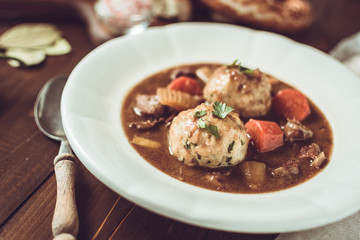 Traditional Scandinavian Venison Stew with Bacon and Onion Dumplings