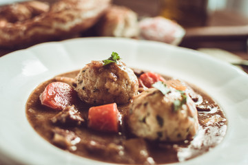 Traditional Scandinavian Venison Stew with Bacon and Onion Dumplings