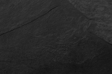 Dark grey black slate background or texture.