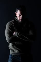 Sport fashion and style. Bearded man with hands folded in sweatshirt. Macho with beard wear casual clothes. Fashion model in stylish sportswear. Lifestyle for active and healthy man