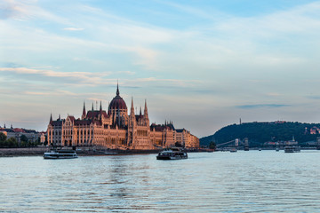 Fototapeta premium Hungarian parliament building in Budapest at sunset, view from the Danube river