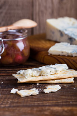 Obraz na płótnie Canvas Gorganzola cheese with fresh gooseberries and berry jam