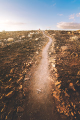 Roads and dirt roads with a beautiful sunset on the horizon. Tenerife, Canary Islands