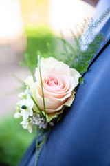 Corsage from man groom suit on wedding day.