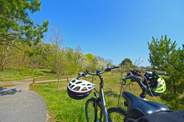 Obraz premium Two bicycles standing with accessories in the countryside of Berlin, Germany