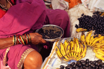 Indian woman selling fresh fruits