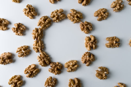 Walnuts placed in a form of a sun. Creative concept of health and wellness. Nuts