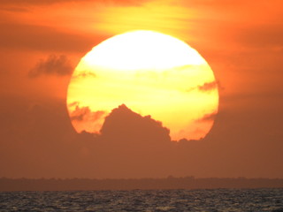 sleeping man in th clouds at sunset © Melanie