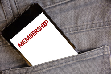 Handwriting text writing Membership. Concept meaning Being member Part of a group or team Join an organizationConcept on cell phone into jean pocket white screen black and red letters.