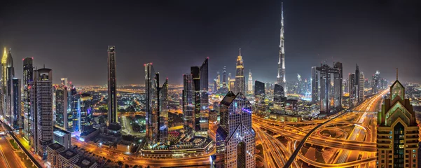 Foto op Plexiglas Burj Khalifa Panorama van de skyline van Dubai tijdens zonsondergang, Verenigde Arabische Emiraten.