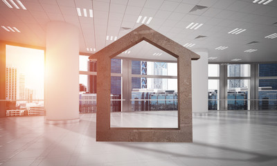 Fototapeta premium Conceptual background image of concrete home sign in modern office interior