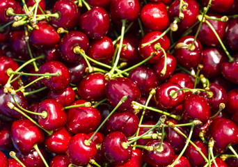  Red fresh cherry. Background with cherries.